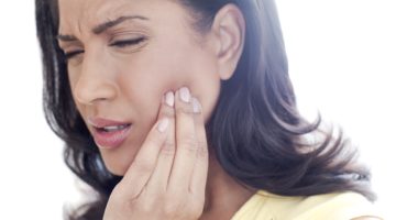 Woman feels TMJ in her jaw